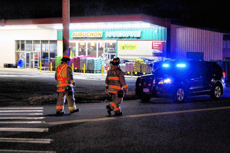 Police and firefighters respond to a bomb threat at the Walgreens on Avenue A in Turners Falls Monday night. 