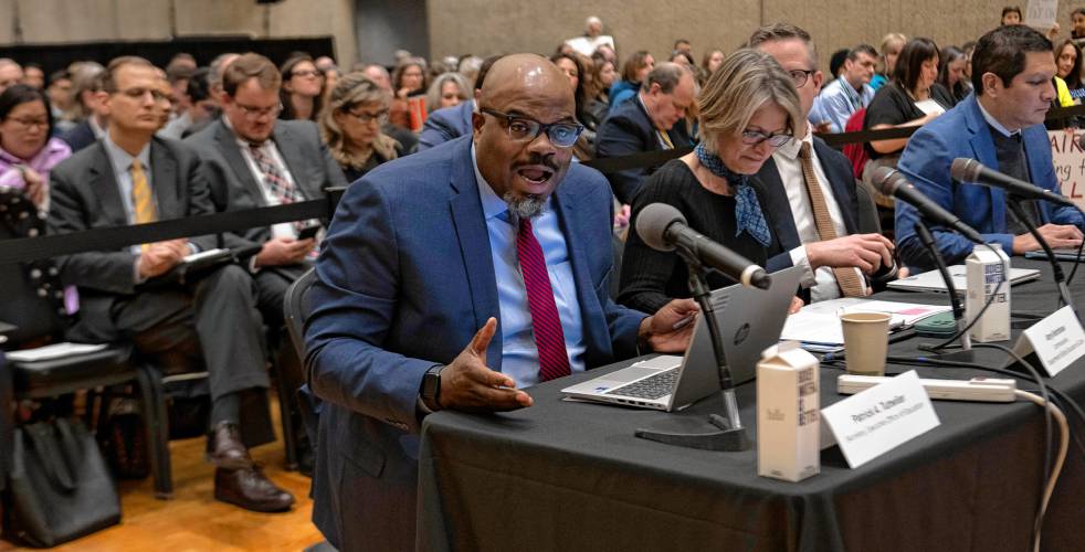 Patrick Tutwiler, the secretary of education, speaks during a hearing of the Joint Committee on Ways and Means at the UMass Campus Center Monday morning. 