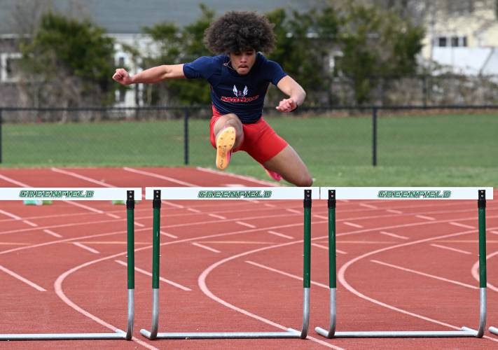 Mahar’s Mitchell Krasco clears the last hurdle on his way to winning the 400 meter hurdles at Greenfield High School earlier this season. 