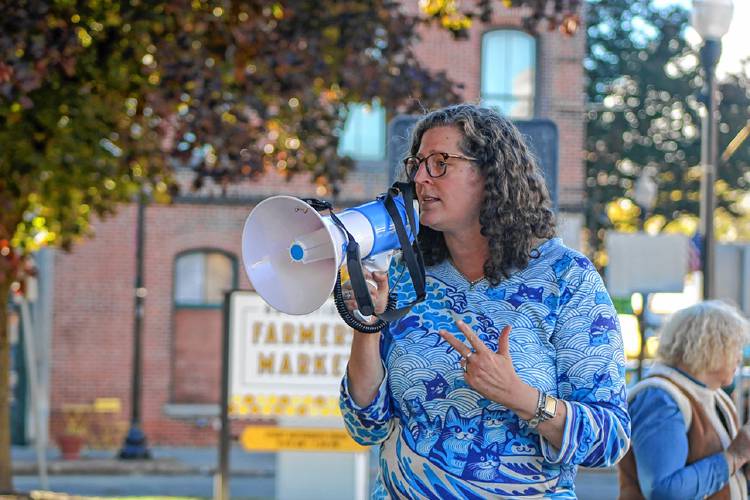 North Adams resident Tara Jacobs, who is running unopposed for reelection to her seat on the Governor’s Council representing District 8, speaks to a crowd of roughly 30 people during a rally in support of the Harris-Walz campaign on the Greenfield Common on Saturday.