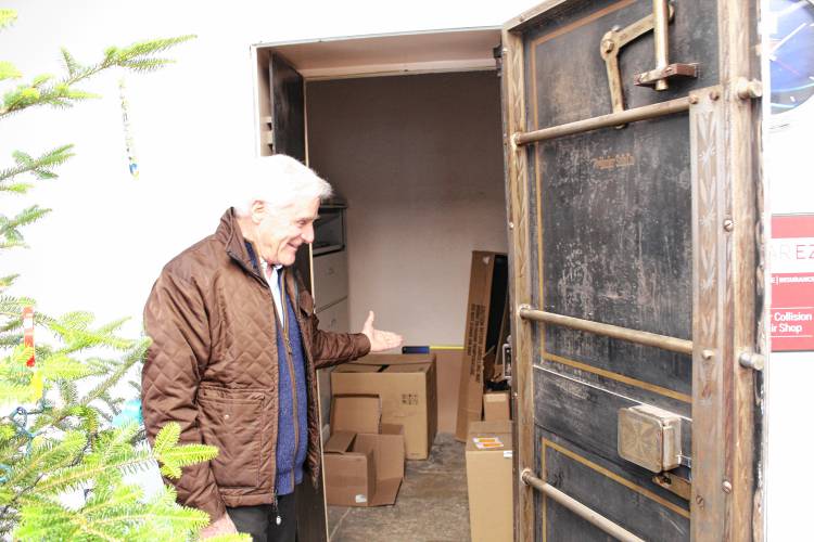 Bob Cartelli opens the door to a walk-in safe found at the site of his renovated Deerfield Street auto body shop in Greenfield. Bob Cartelli opens the door to a walk-in safe found at the site of his renovated Deerfield Street auto body shop in Greenfield.