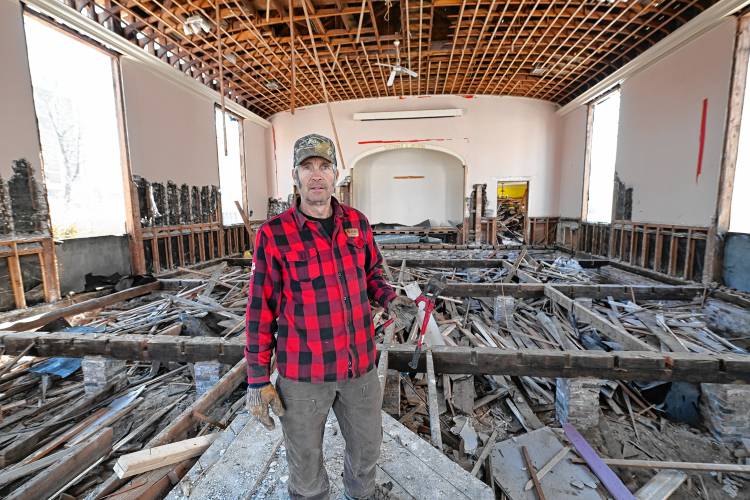 Philip Stevens, owner of Carter & Stevens Farm LLC in Barre, is in the process of dismantling the former Zion Korean Church on Main Street in Greenfield, and will rebuild it in Barre using the post-and-beam frame and other salvaged details.
